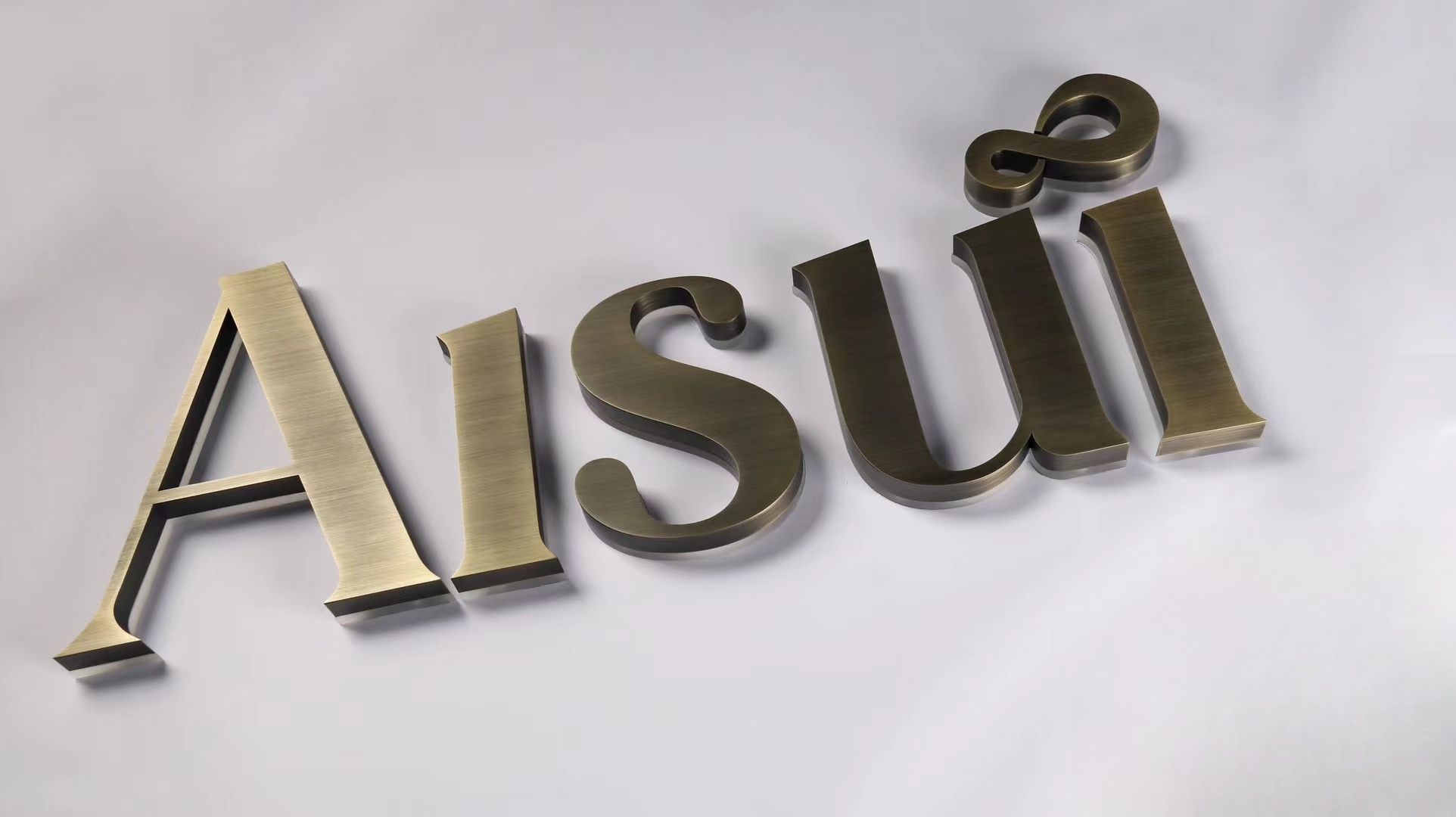 Halolit Channel Letters | Brushed Stainless Steel | Antique Green Bronze